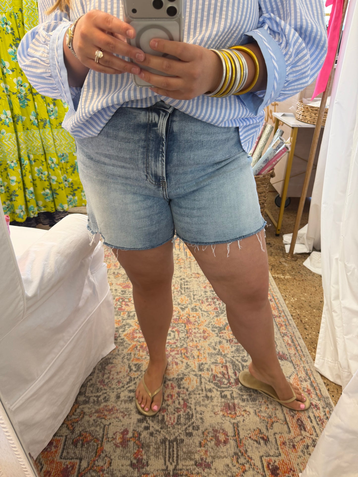 Distressed hem denim shorts