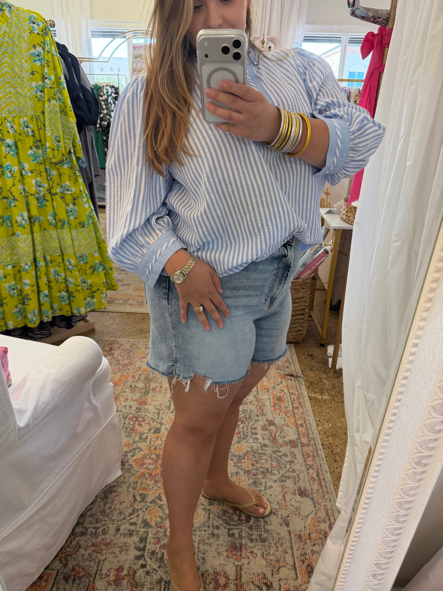 Distressed hem denim shorts