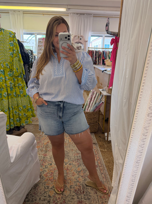 Distressed hem denim shorts